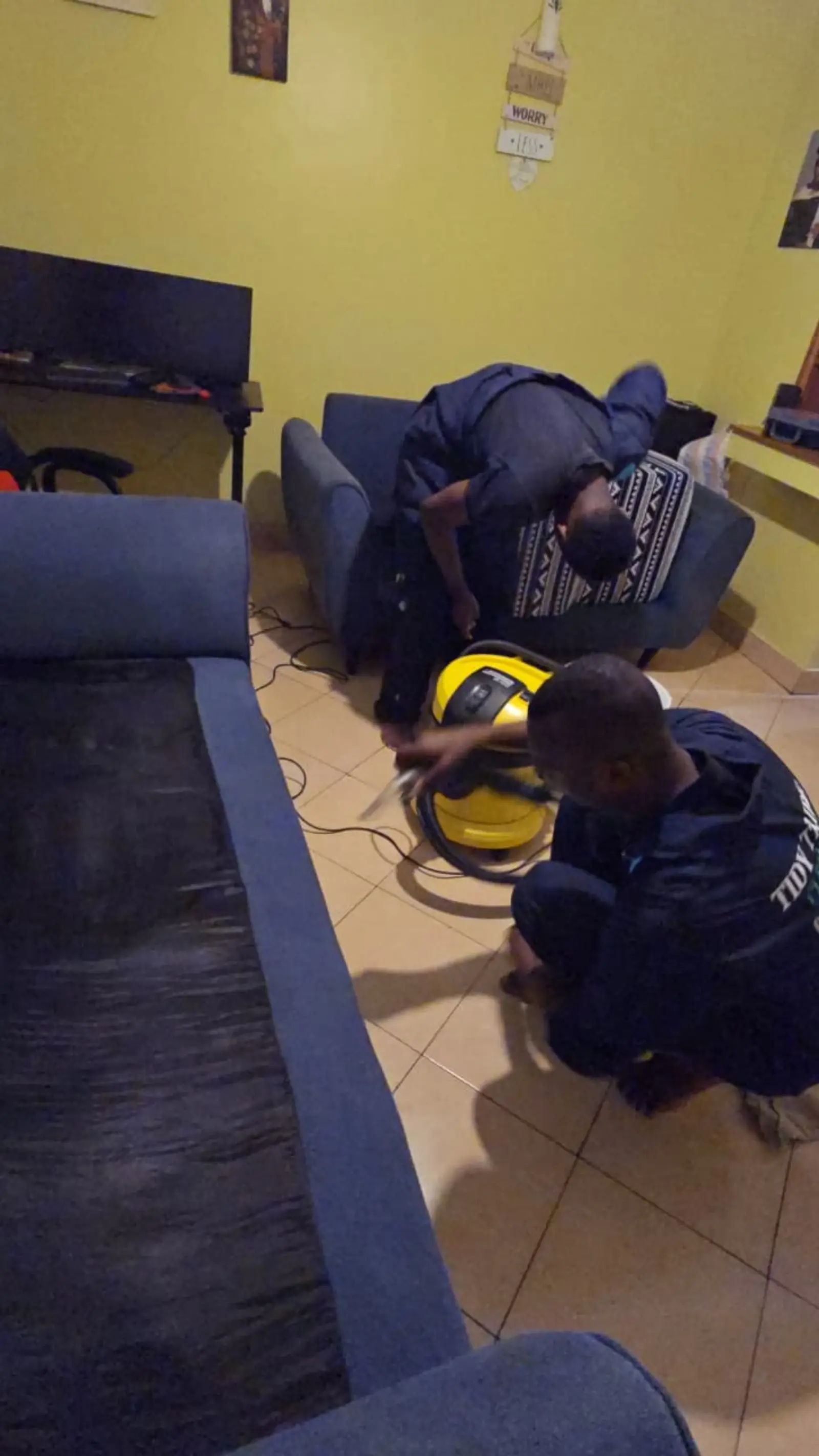 Sofa frame being cleaned section by section